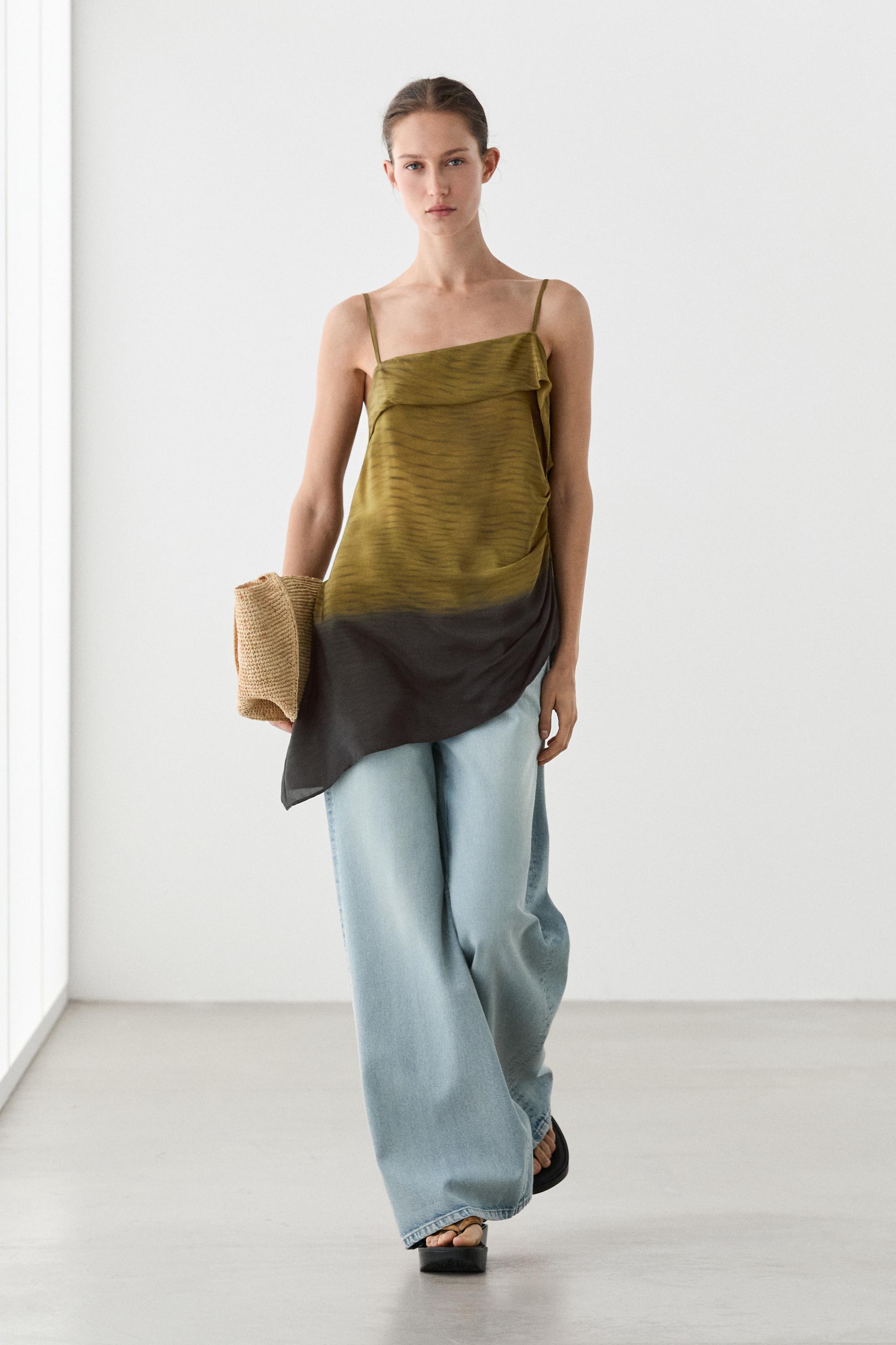 Asymmetric strappy top with draped detail
